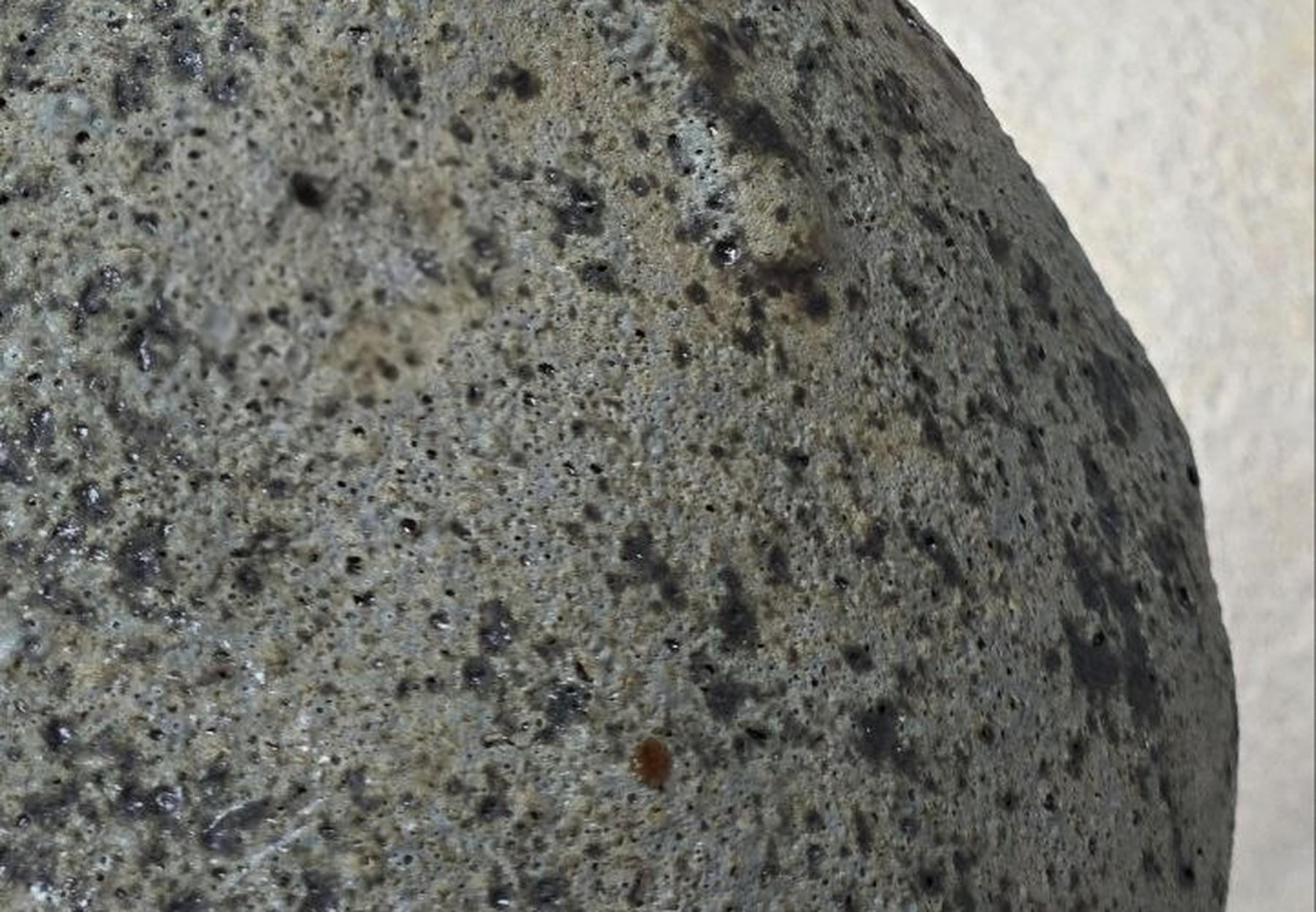 Close view of a speckled grey ceramic surface